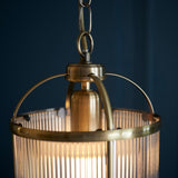 1 Light Pendant in Antique Brass with Clear Ribbed Glass Panels (0711LAM106710)