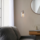 1 Light Pendant in Antique Brass with Clear Textured Glass (0711LYR106923)