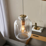 1 Light Pendant in Antique Brass with Clear Textured Glass (0711LYR106923)