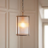 1 Light Pendant, Antique Brass Plated with Clear Ribbed Glass (0711RID118595)