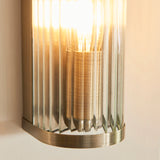 1 Light Wall Light, Antique Brass Plated with Clear Ribbed Glass (0711RID118596)