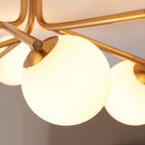 6 Light Semi flush, Brushed Aged Brass / Matt Opal Spheres (0711AAR118651)