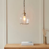1 Light Pendant finished in Aged Brass with Clear Glass Shade (0711ASH120624)
