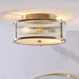 2 Light Flush, Antique Brass Plated with Clear Ribbed Glass (0711RID120847)