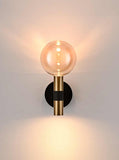 2 Light Wall Light in Matt Black and Satin Brass with Amber Glass (0194MERWB623539)