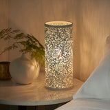 A Decorative table lamp which provides a pattern light effect when on (0711SEC55473)