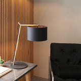 Angular table light in matt brass with black shade (0711STY92625)